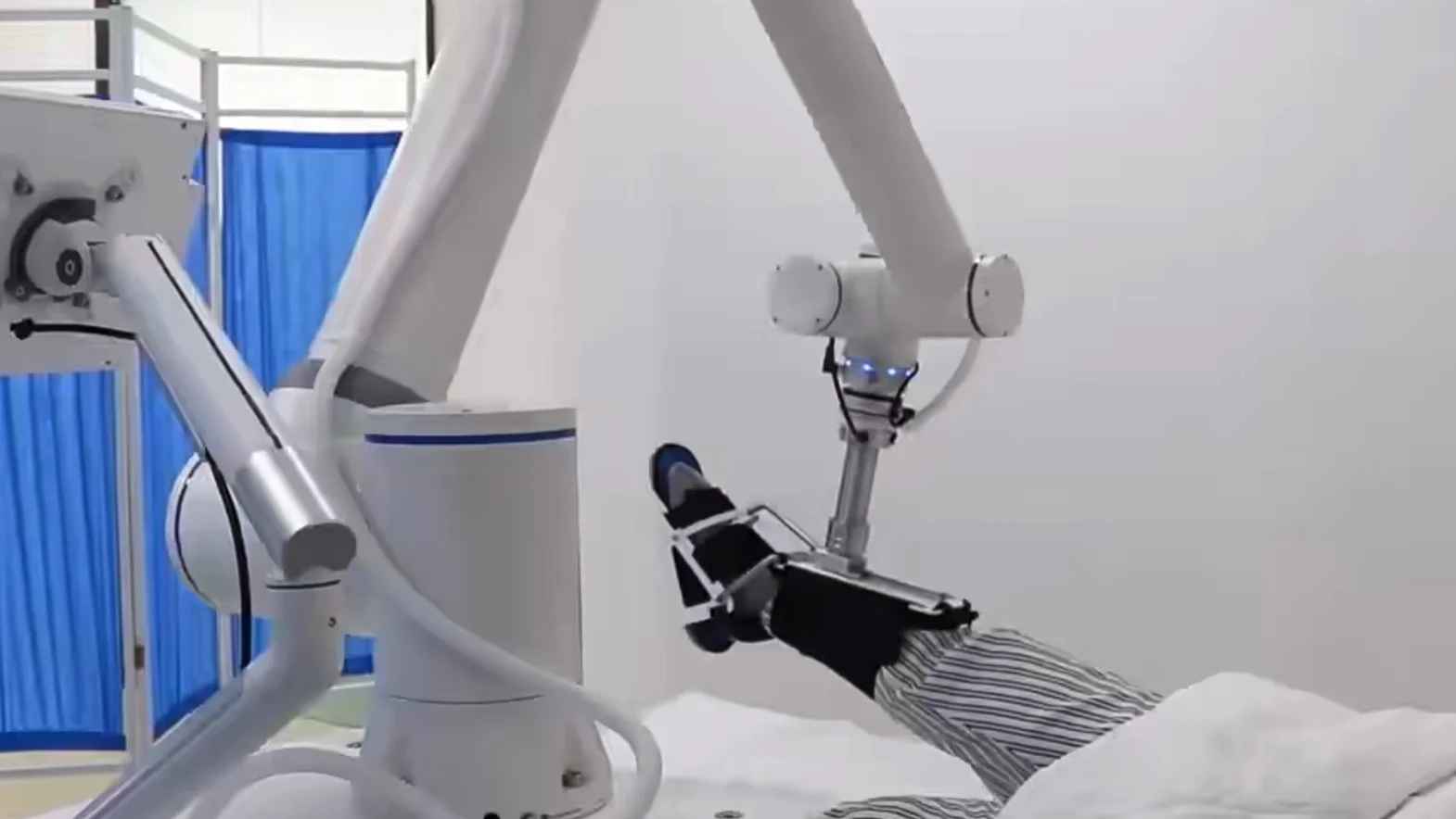 Education and research scene: collaborative robotic arm on a research bench rig.