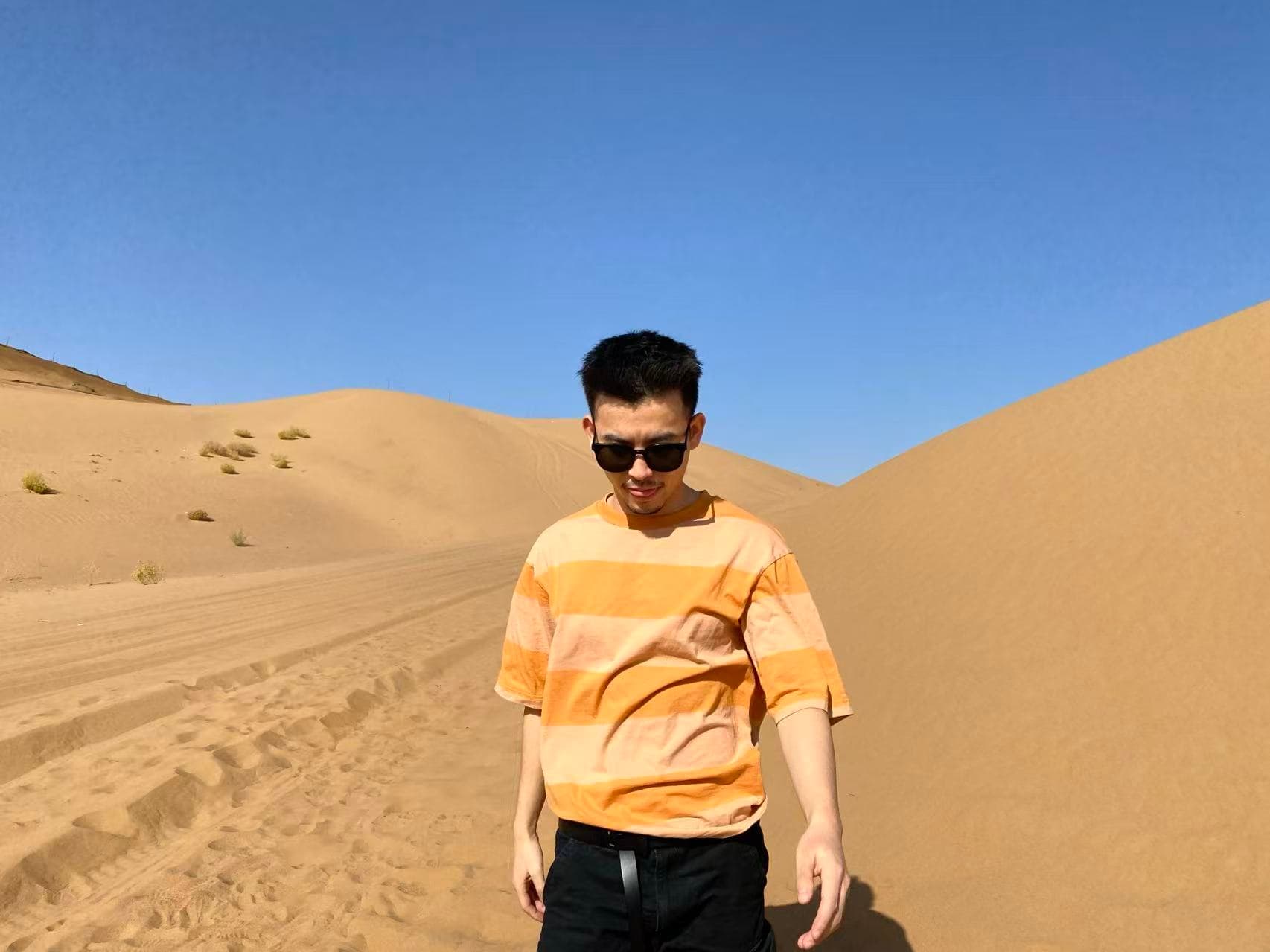 A vast desert landscape during golden hour—inviting viewers to explore the Roooll r-Series.